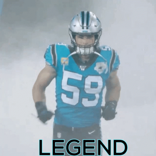 A Football Player Wearing A Blue Jersey With The Number 59 On It GIF