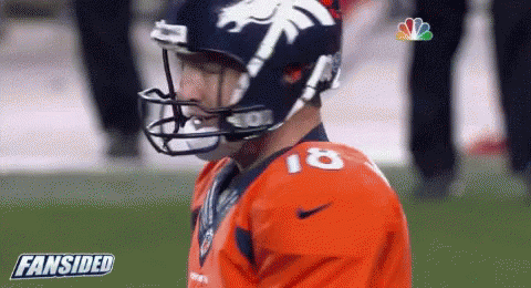a football player wearing a helmet and jersey with the number 18 on it