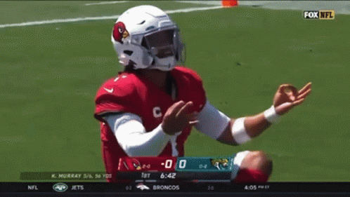 A Football Player Wearing A Helmet That Says Cardinals On It GIF