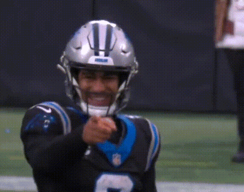 A Football Player Wearing A Helmet That Says Nfl On It GIF
