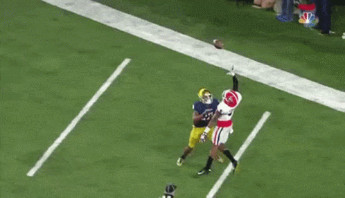 A Football Player Wearing A Jersey That Says Notre Dame On It GIF