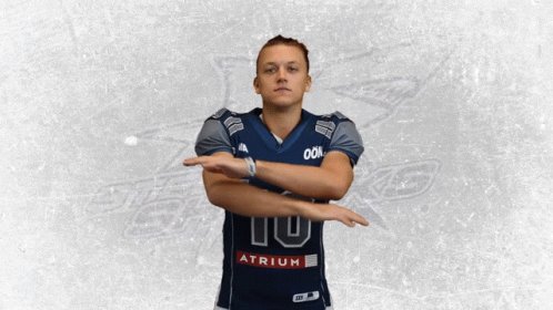 A Football Player Wearing A Jersey With The Number 10 GIF