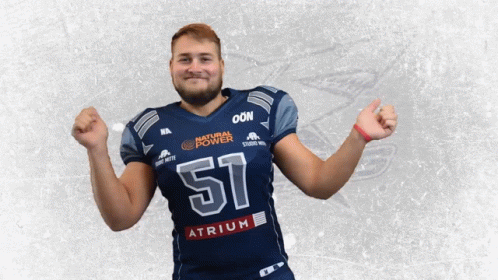 A Football Player Wearing A Jersey With The Number 51 On It GIF