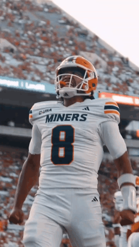 a football player wearing a miners jersey with the number 8