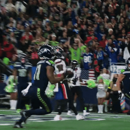 a football player wearing a number 1 jersey is running on the field