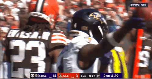 A Football Player Wearing A Number 23 Jersey GIF