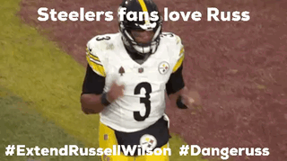 A Football Player Wearing A Number 3 Jersey Is Running On The Field GIF