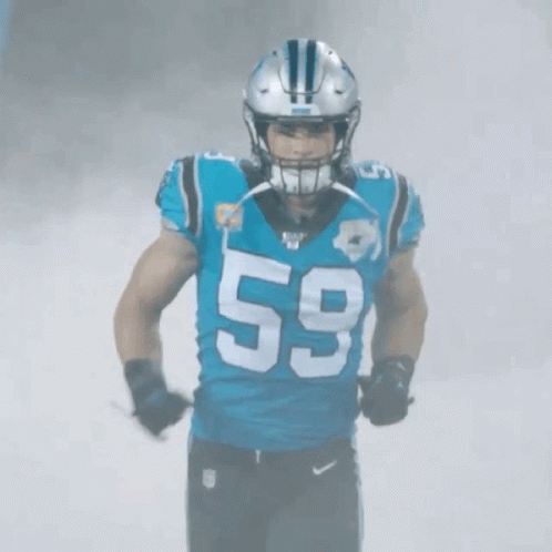 A Football Player Wearing A Number 59 Jersey GIF