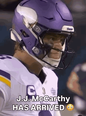 A Football Player Wearing A Purple Helmet With The Words `` J.j. Mccarthy Has Arrived '' On It . GIF