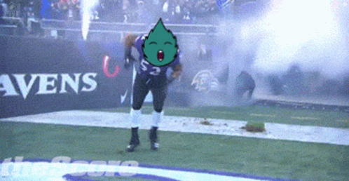 A Football Player Wearing A Ravens Jersey Stands On The Field GIF