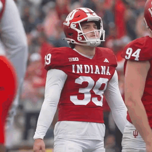 A Football Player Wearing A Red Indiana Jersey GIF