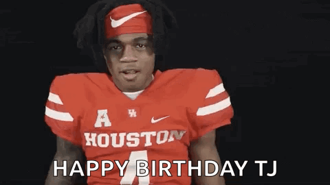 A Football Player Wearing A Red Jersey And A Headband Is Saying Happy Birthday . GIF