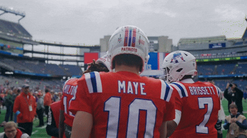 a football player wearing a red jersey with the name maye on the back