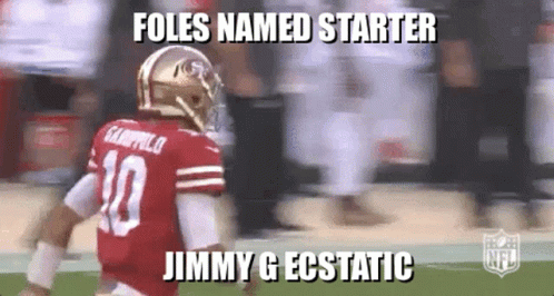 A Football Player Wearing A Red Jersey With The Number 10 On It . GIF