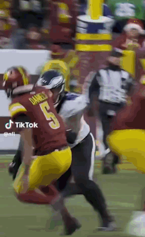 A Football Player Wearing A Red Jersey With The Number 5 On It GIF