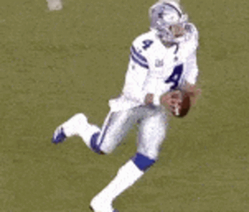 A Football Player Wearing A White Jersey With The Number 4 On It GIF