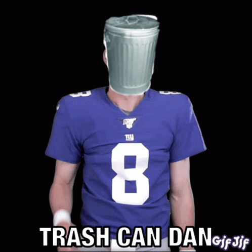 A Football Player With A Trash Can On His Head Giving A Thumbs Up Sign GIF
