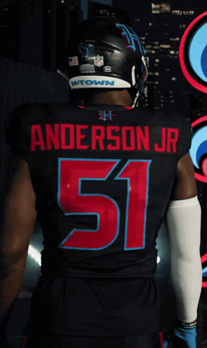 A Football Player With The Name Anderson Jr On The Back Of Their Jersey GIF