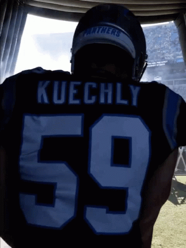 A Football Player With The Name Kuechly And The Number 59 On His Jersey GIF