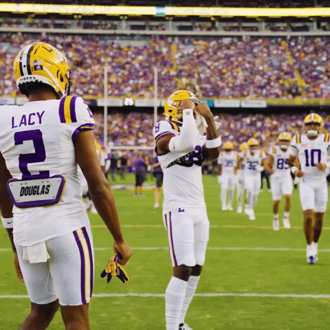 A Football Player With The Name Lacy On His Jersey GIF