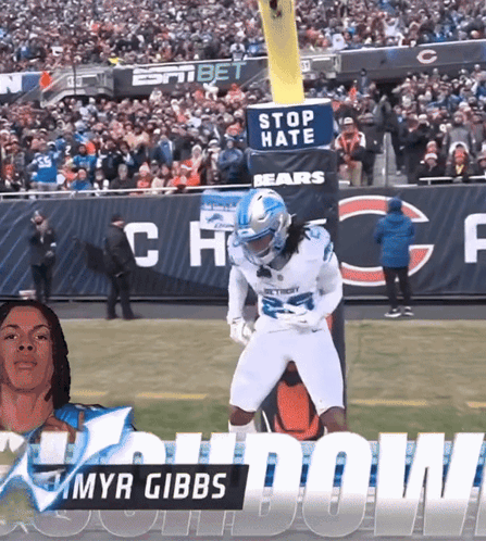 A Football Player With The Name Myr Gibbs On His Jersey GIF