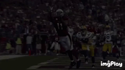 A Football Player With The Number 1 On His Jersey Is Catching The Ball GIF