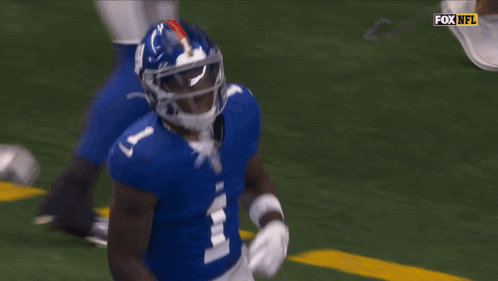 A Football Player With The Number 1 On His Jersey Is Running On The Field GIF