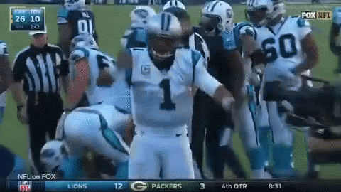 A Football Player With The Number 1 On His Jersey Stands In A Huddle With Other Players GIF