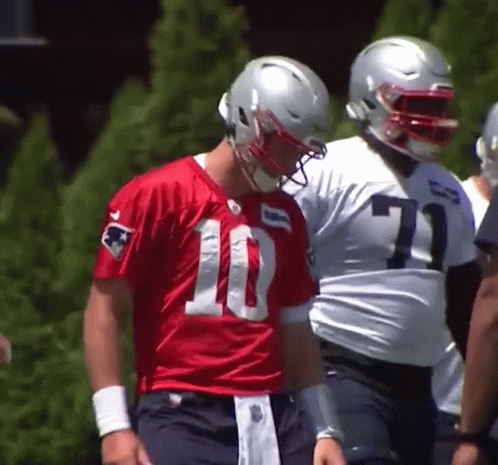 A Football Player With The Number 10 On His Jersey GIF