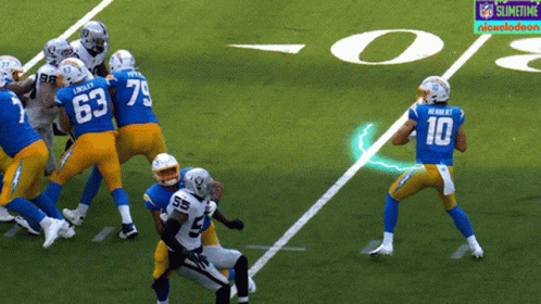 A Football Player With The Number 10 On His Jersey Throws A Pass GIF