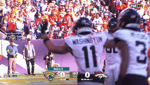 A Football Player With The Number 11 On His Back GIF
