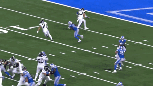 A Football Player With The Number 11 On The Back Of His Shirt GIF