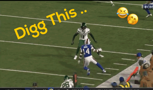 A Football Player With The Number 13 On His Jersey Is Being Tackled GIF