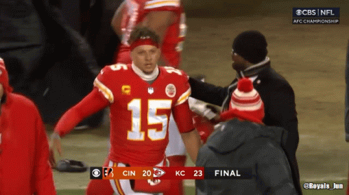 A Football Player With The Number 15 On His Jersey Stands On The Field GIF
