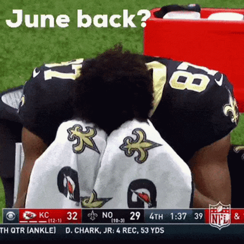 A Football Player With The Number 16 On His Jersey Is Kneeling Down GIF