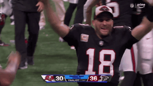 A Football Player With The Number 18 On His Shirt GIF