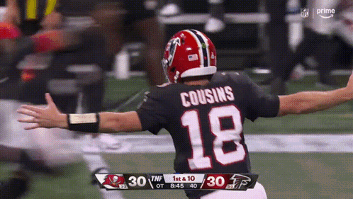 A Football Player With The Number 18 On The Back Of His Shirt GIF