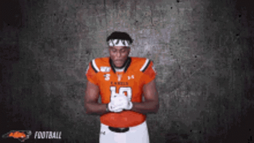 A Football Player With The Number 19 On His Shirt GIF