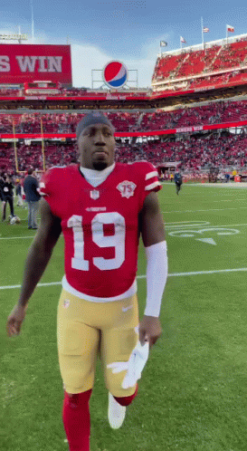 A Football Player With The Number 19 On His Shirt GIF