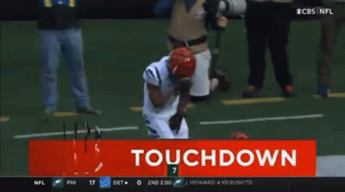 A Football Player With The Number 28 On His Back GIF