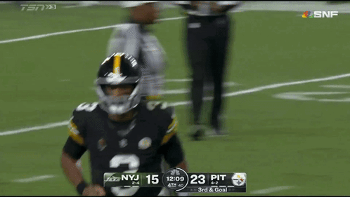 A Football Player With The Number 3 On His Jersey Runs On The Field GIF