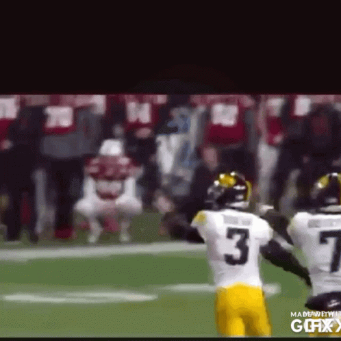 A Football Player With The Number 3 On His Jersey Runs On The Field GIF