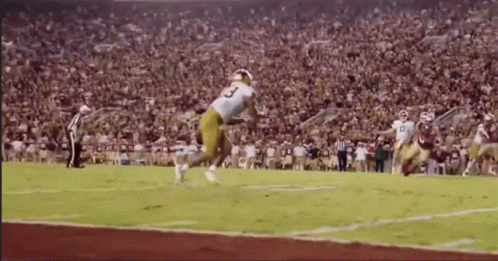 A Football Player With The Number 3 On The Back Of His Jersey GIF