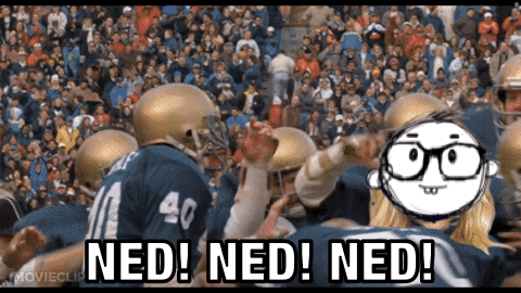 A Football Player With The Number 40 On His Jersey Is Surrounded By Other Players GIF