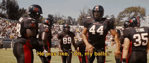 A Football Player With The Number 44 On His Jersey Stands On The Field GIF