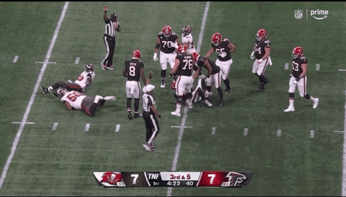 A Football Player With The Number 50 On His Helmet GIF