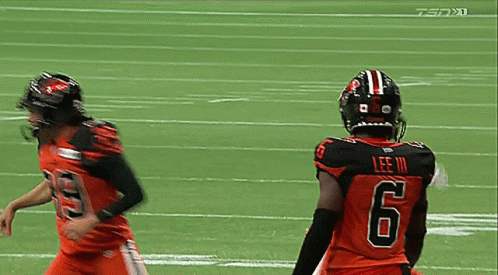 A Football Player With The Number 6 On His Back Is Running On The Field GIF