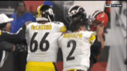 A Football Player With The Number 66 On Their Jersey GIF