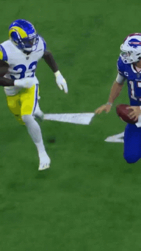 A Football Player With The Number 7 On His Jersey Is Falling GIF
