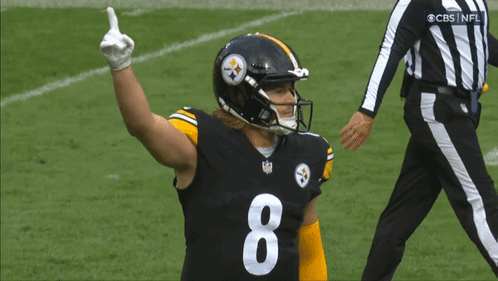 A Football Player With The Number 8 On His Jersey Is Giving A Thumbs Up GIF